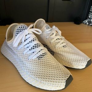 Womens adidas running shoes, size 9. Never worn. Originally paid $200.00